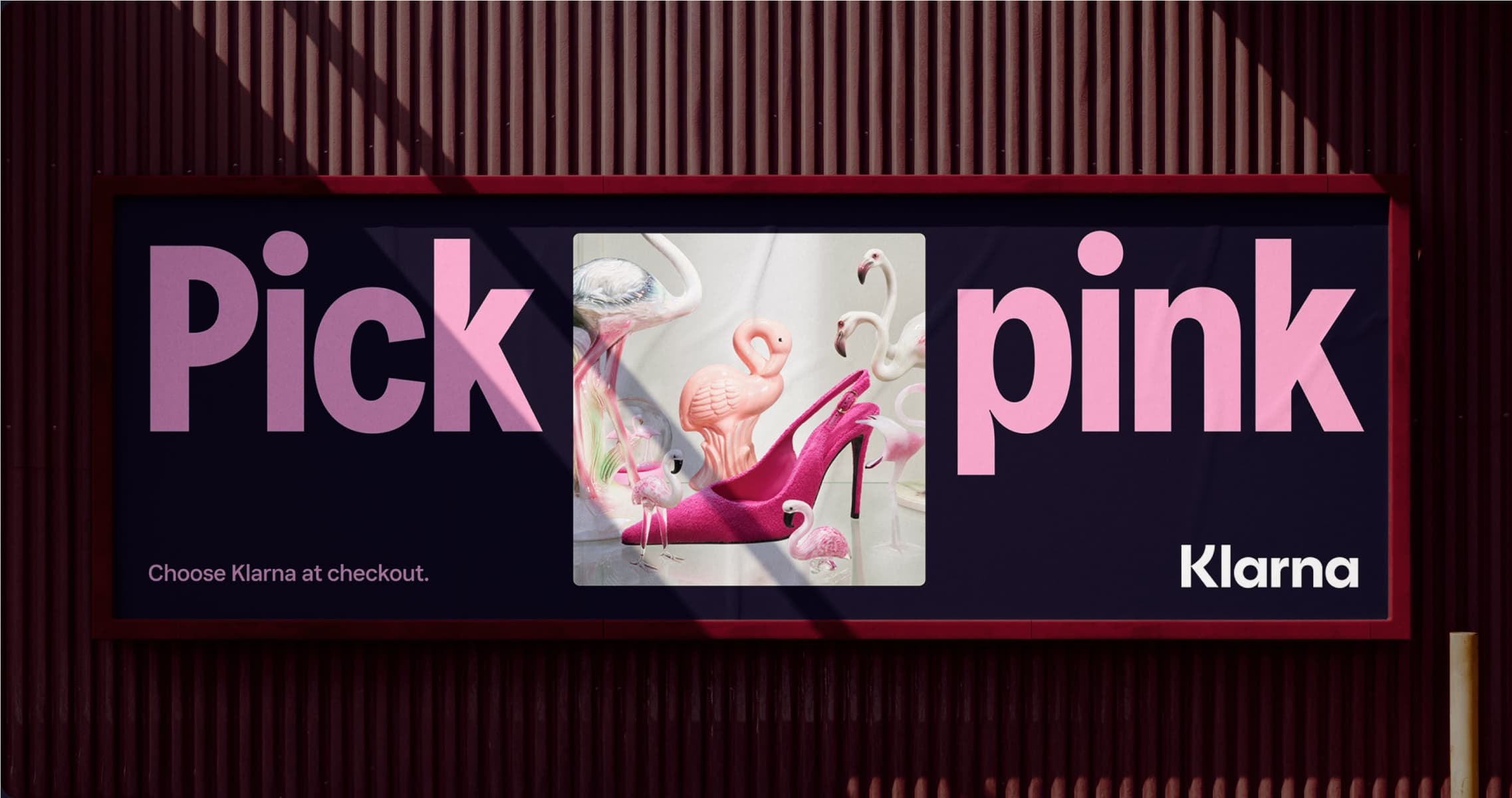 Billboard with flamingo and the text 'Pick Pink'